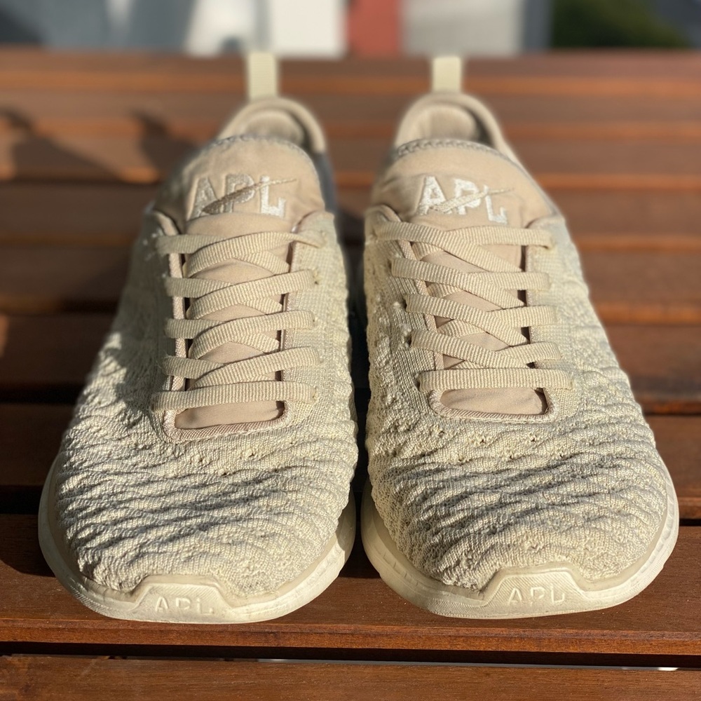 APL women’s sneakers in size 9 color cream